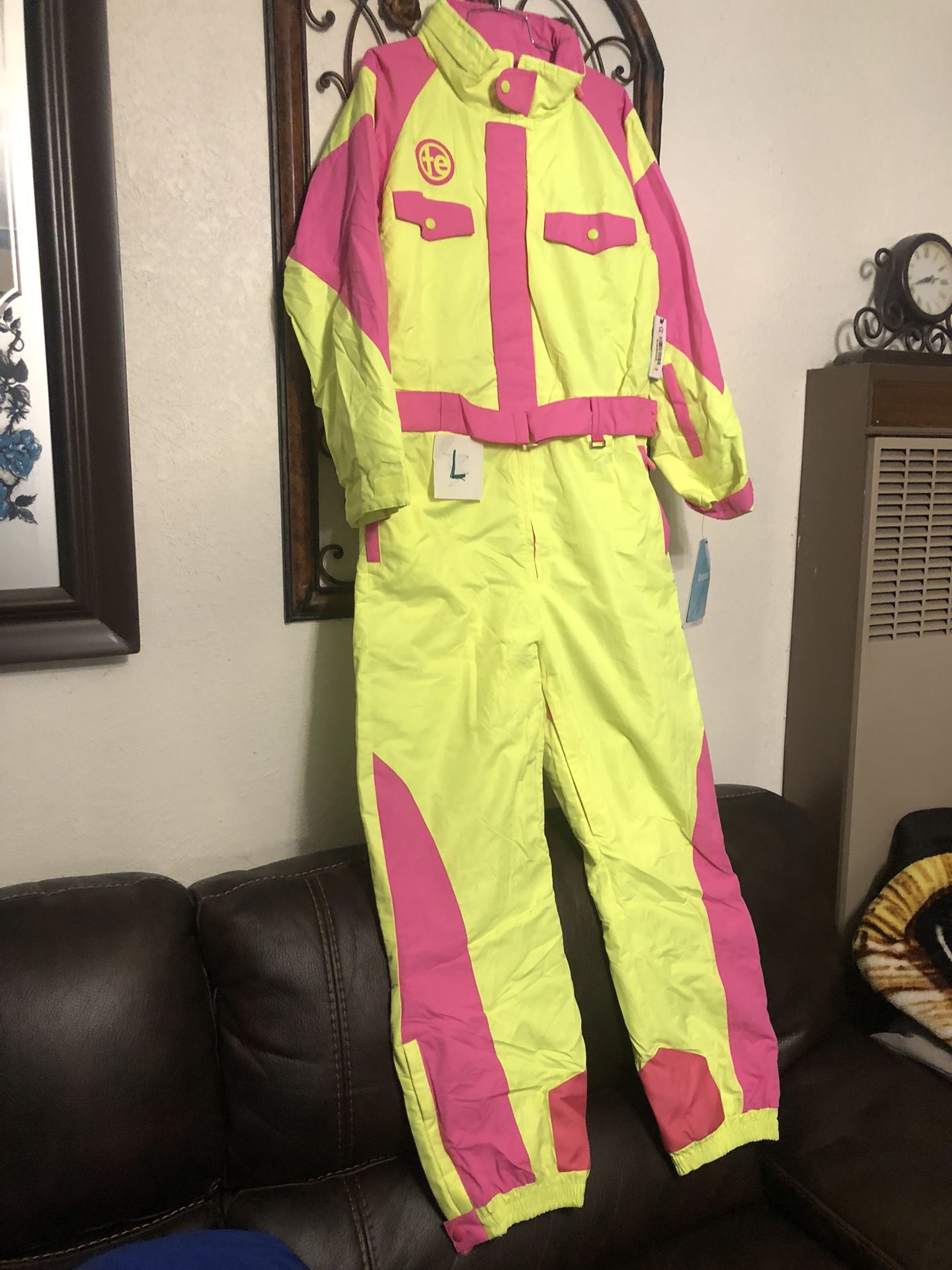 TIPSY SKI SUIT SIZE LARGE NEW ASKING 100 FIRM CASH ONLY