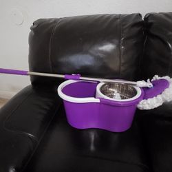 Brand new mop with bucket.