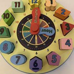 Melissa & Doug Wooden Clock  Teaches Time, Shapes and Numbers