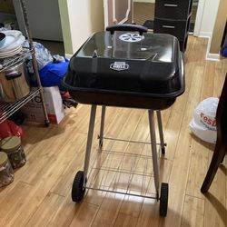 Charcoal grill with wheels $25