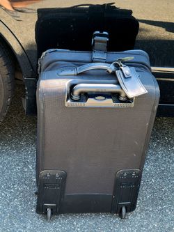 Tumi Carry-on suitcase