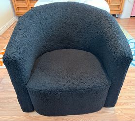 Black Swivel Teddy Chair – $50