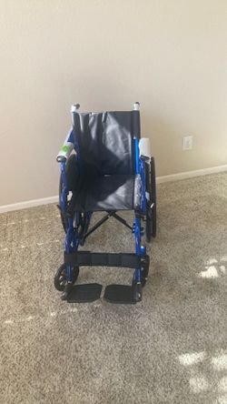 Wheelchair New with 16” seat and footrests