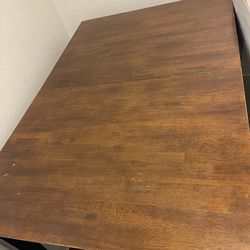 Brown coffee/dining room table