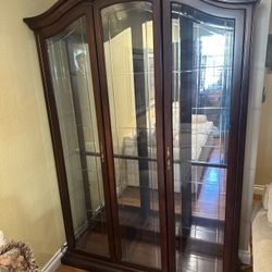 Dark brown wood Curio, Armoire Dresser and Entertainment Center - $300