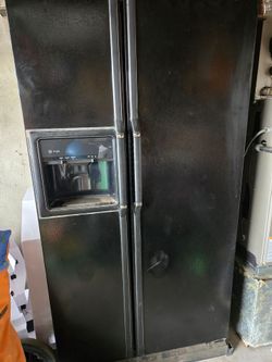 GE Profile Side-by-Side Refrigerator with Ice Dispenser