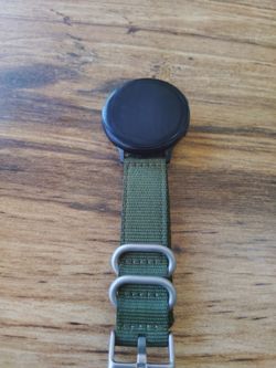Round Smartwatch with Green NATO Strap $65 with charger
