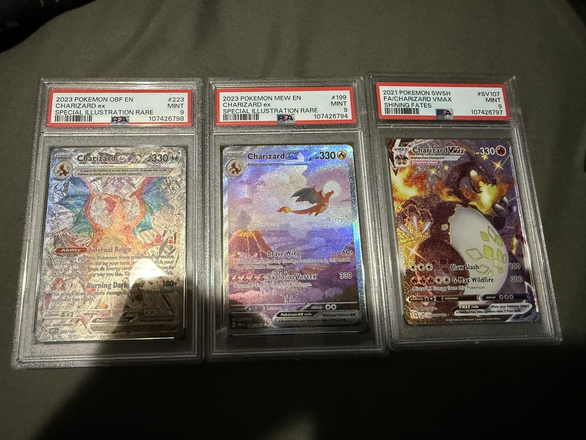 POKEMON CHARIZARD SLABS