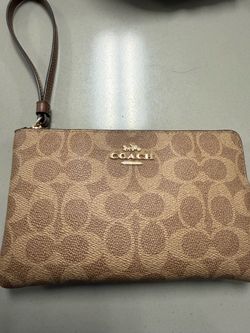 Brown coach wrist wallet