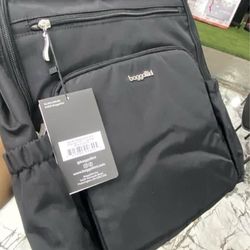 New baggallini laptop backpacks and side bags/purses