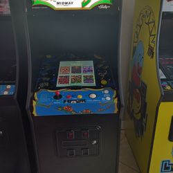 ABSOLUTELY BEAUTIFUL 60 IN 1 GALAGA MACHINE WITH A HIGH DEFINITION SCREEN / SET ON FREE PLAY.
