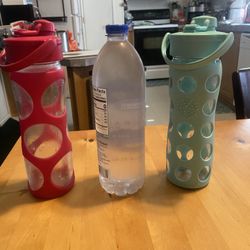 $30— (absolutely firm on price) For 2 as a set—16 ounce glass water bottles with silicone sleeves. Bought online and has been Washed and sterilized in