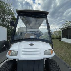 Brand-Bintelli Gold Cart. Model- Electric. Year-2018 Color-White. Size-12ft