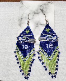 🏈 Game day Earrings-3 pair available 💙💚🤍