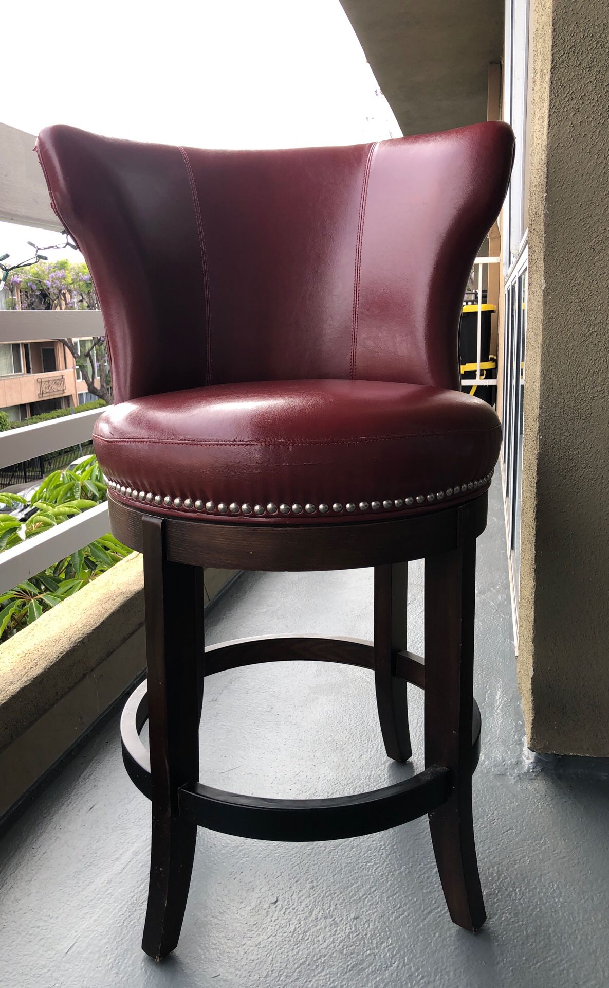 Vintage swivel red bar stool