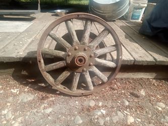 Vintage Heavy Duty Wood Spoked Wheel, Great Yard Art. $30.00.