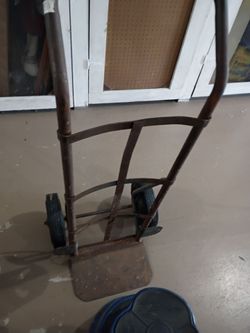 A hand truck with a step stool