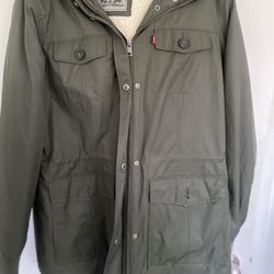 Women’s Levi’s olive green jacket with fur hood size L
