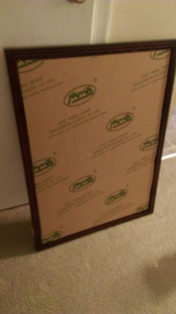 Huge wood frame with door to inside