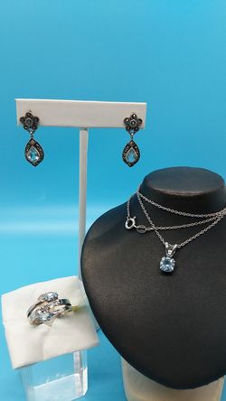 .925 Sterling silver blue topaz ring set