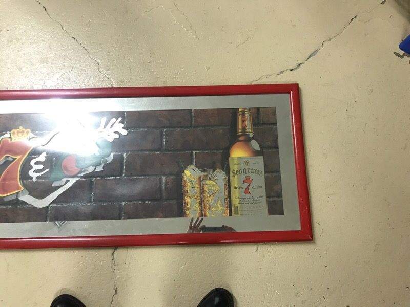 Seven and seven really cool large old mirror advertising