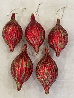 Set of 5 red glass teardrop Christmas ornaments with gold glitter accents. 5.75” tall