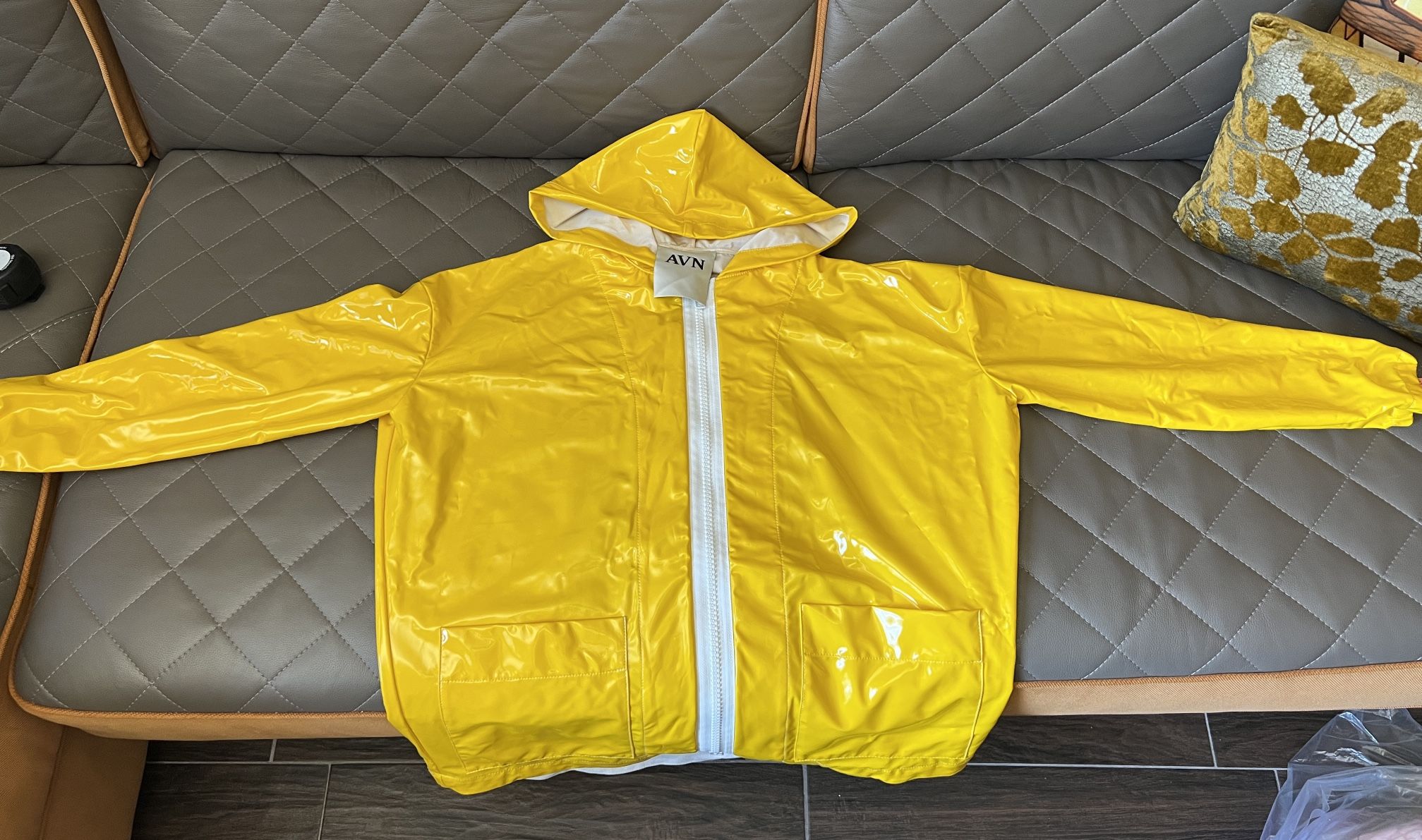 Yellow raincoat for women . Italy
