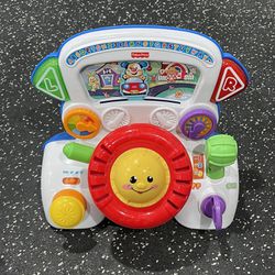 Fisher-Price Laugh & Learn Rumble & Learn Driver - $10