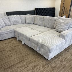 Large Grey Sectional With Pull Out Sofa & Storage Chaise- USB Ports