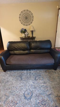 Living room sofa and recliner - well used