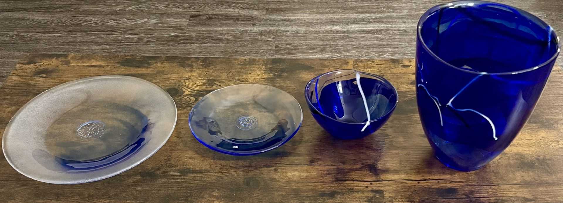 4-Piece Kosta Boda Blue Art Glass Collection (Vase, Bowl & Plates)