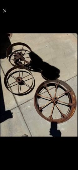 Cast iron wheels, 3 big ones, $40 for all