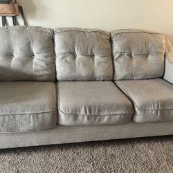 Tan Couch With Built In Pull Out 
