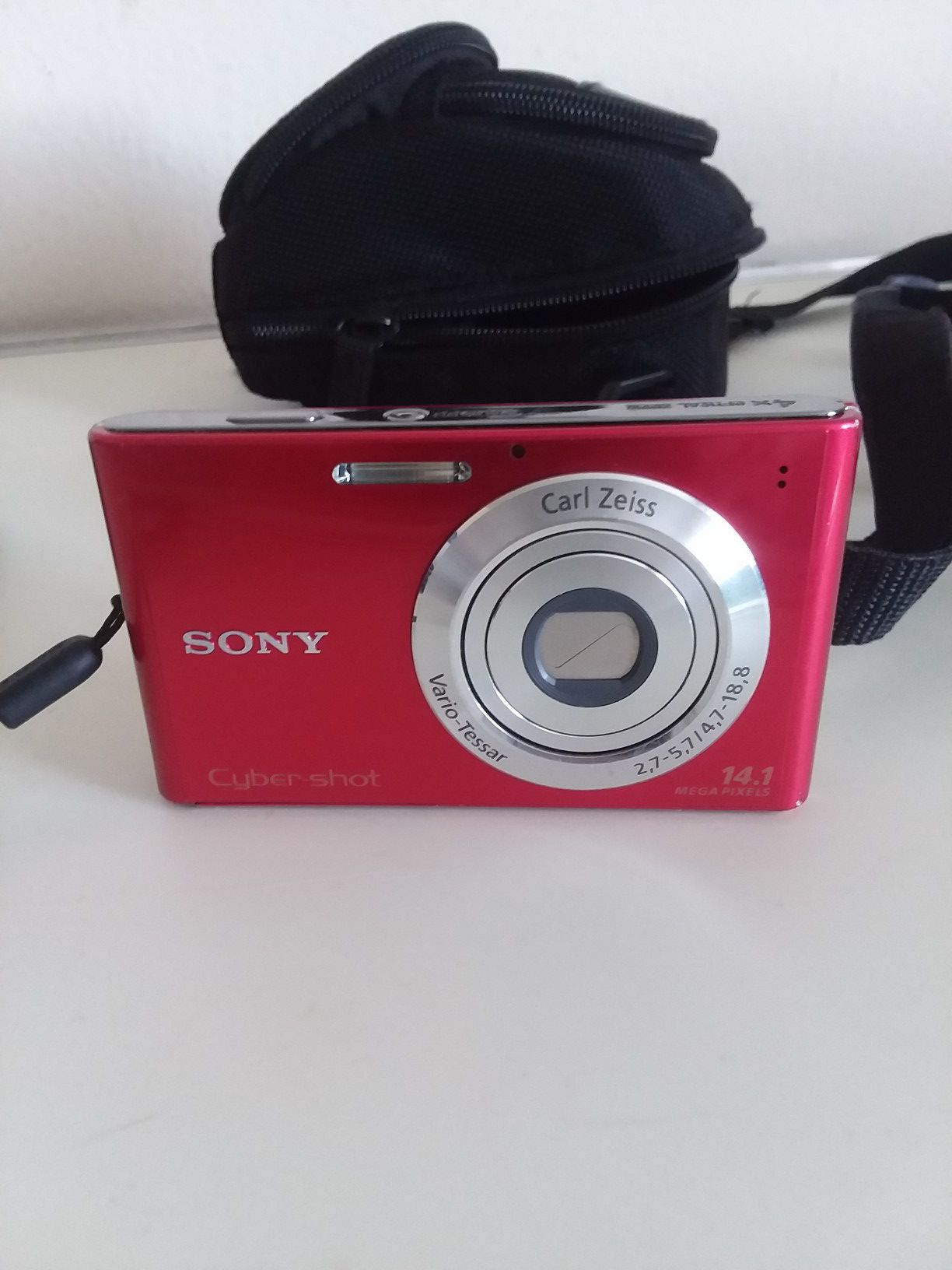 Sony Cyber-shot DSC-W330 camera with 14.1 megapixels red.