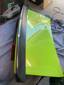 Sublime Green Dodge Challenger trunk lid with tail lights and a spoiler
