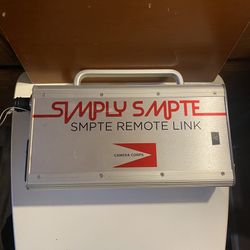 Camera Corps Simply SMPTE Remote Link Interface Box  SMPTE - B-219  Good pre-owned condition.   Product details:  https://offerup.com/redirect/?o=aHR0