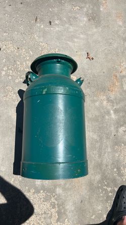 Old metal milk jug