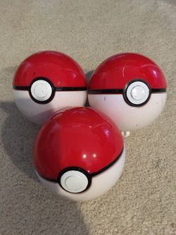 Pokémon Balls All three closes but inside are missing parts and elastic strings