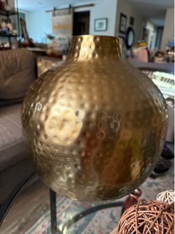Large Hammered Brass Colored Metal Vase Approx 13” x 14”   Stunning hammered metal vase with a round, bulbous body and a narrow neck. This decorative 