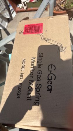 Gas spring monitor mount
