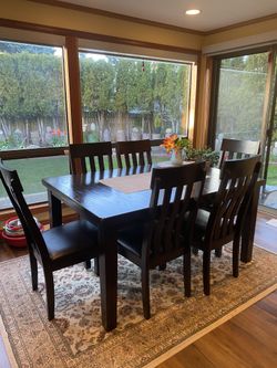 Table with six chairs with matching Cabinet 