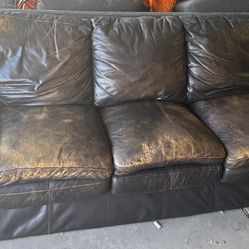 Aged Leather Sofa. Vintage Style Leather Couch