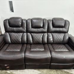 Leather reclining couch and loveseat