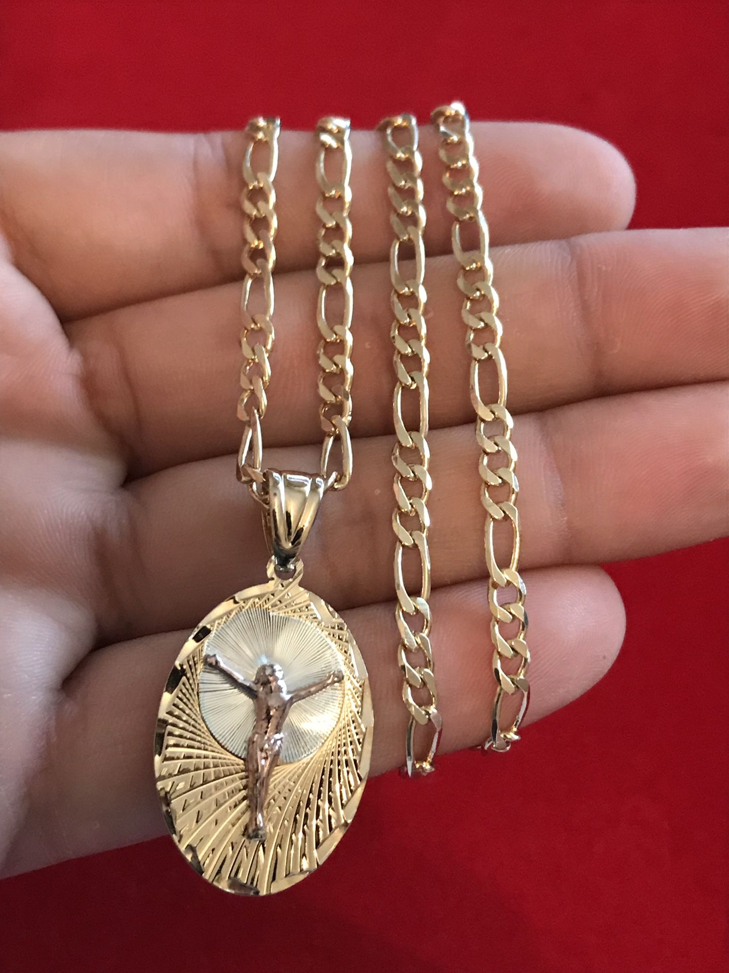 14k gold filled fígaro chain with Jesus charm