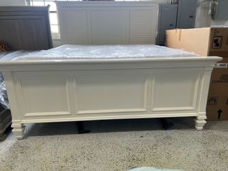 Like new king size bed and box spring and bed