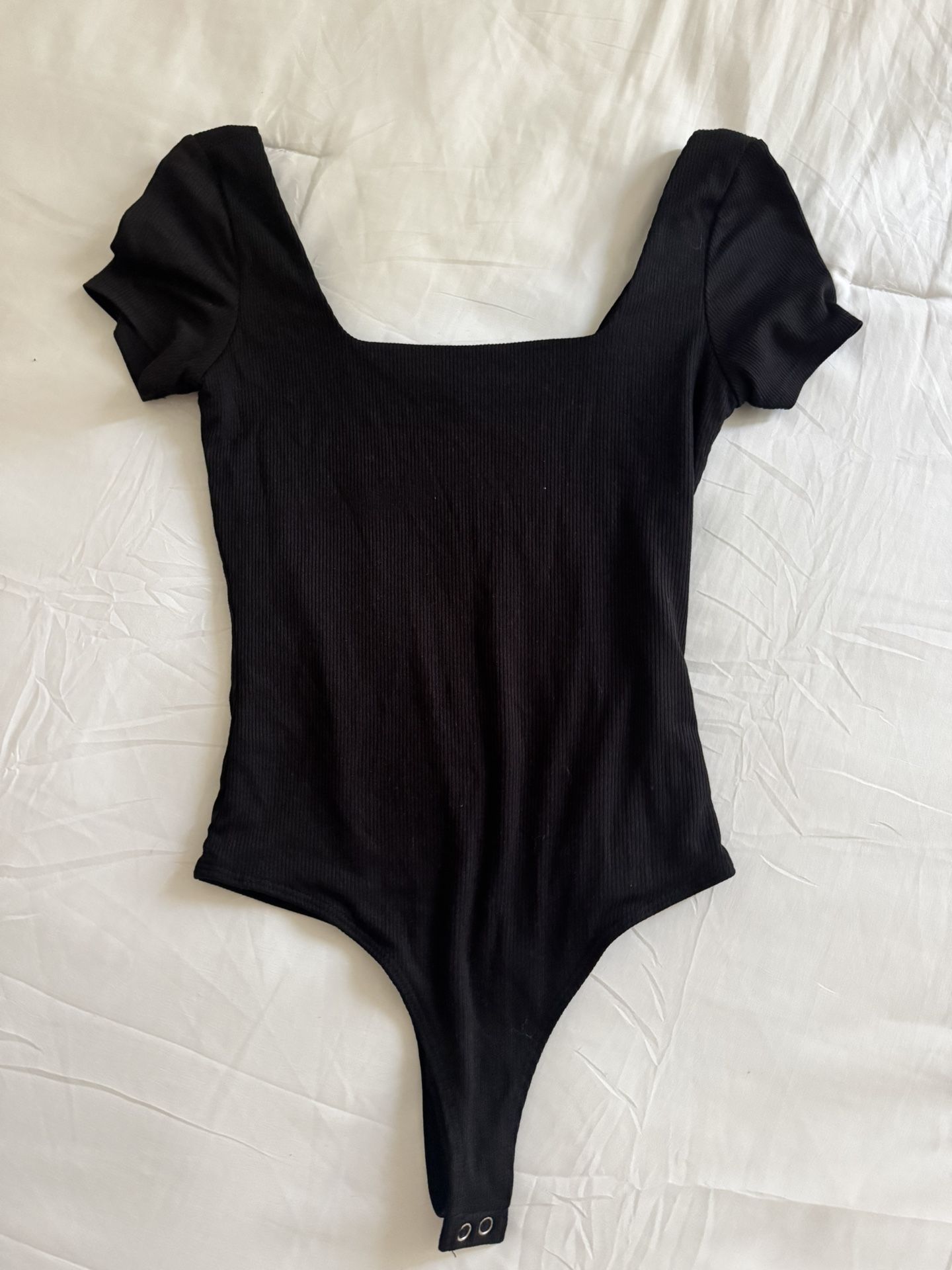 small black bodysuit