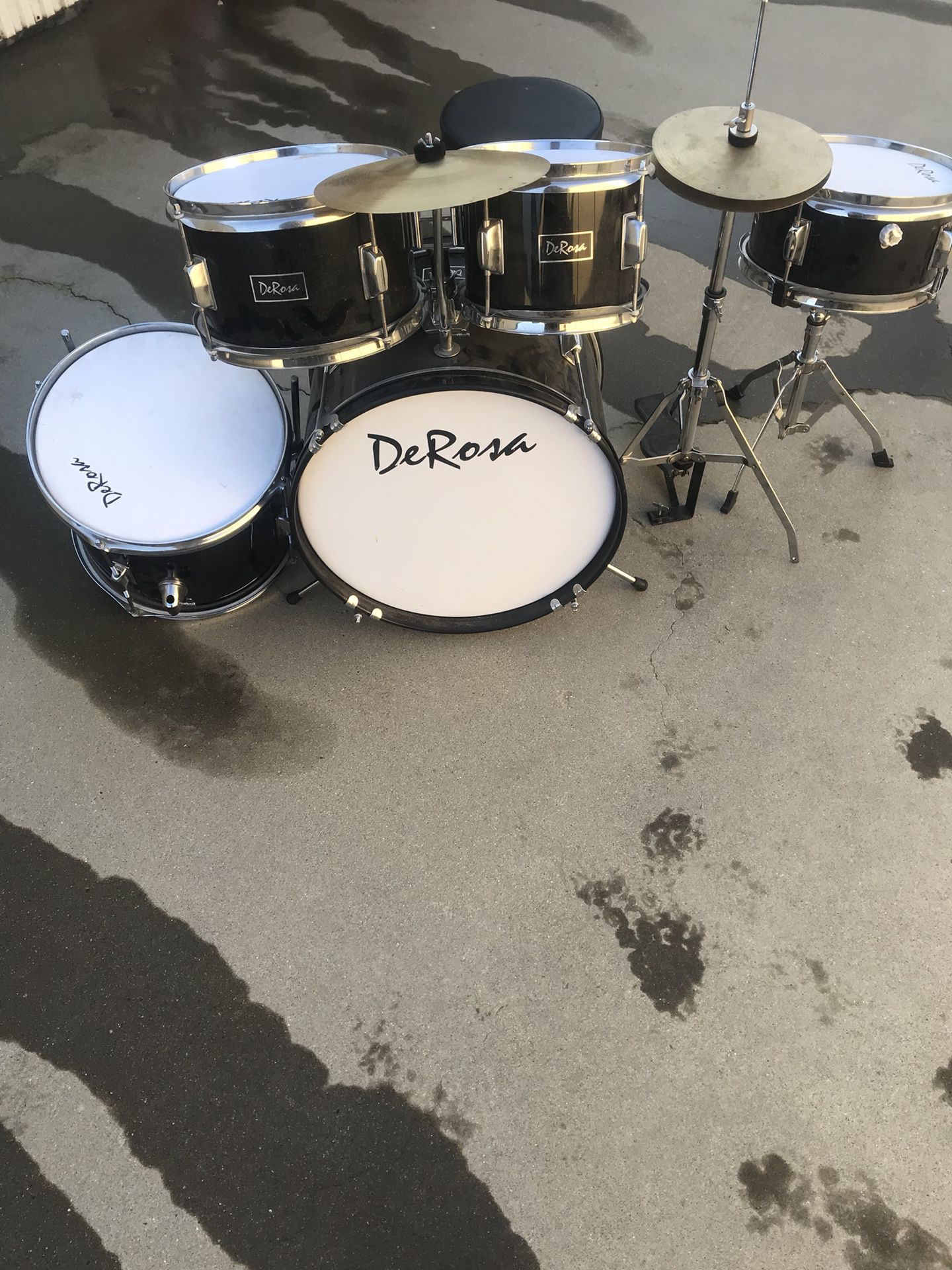 Black youth drum set good condition just dusty comes with chair missing one leg off large drum not necessary $100 as is Pick up only