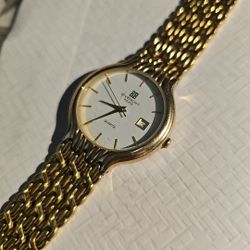 Givenchy Gold Tone Watch