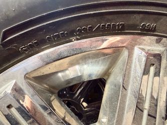 Great condition Good Year high mileage tire with Cadillac rim emblem