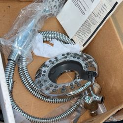 Brand New  Delta inition two in one shower head